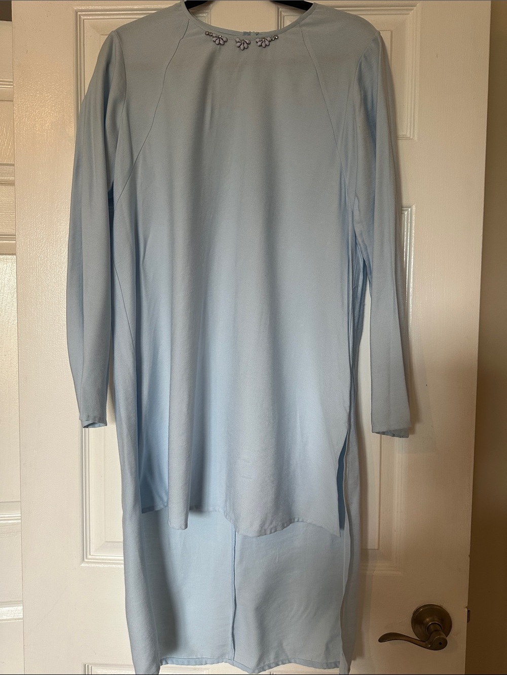 Light Blue Women's Long Sleeve Tunic Top with Embellished Neckline.
